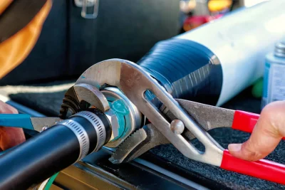 Pipe repair service using professional plumbing tools in Pinellas Park, Florida